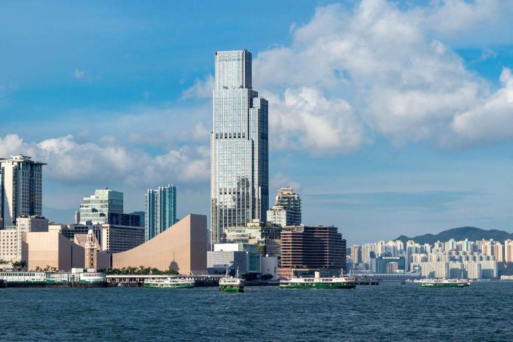 a city skyline with boats 